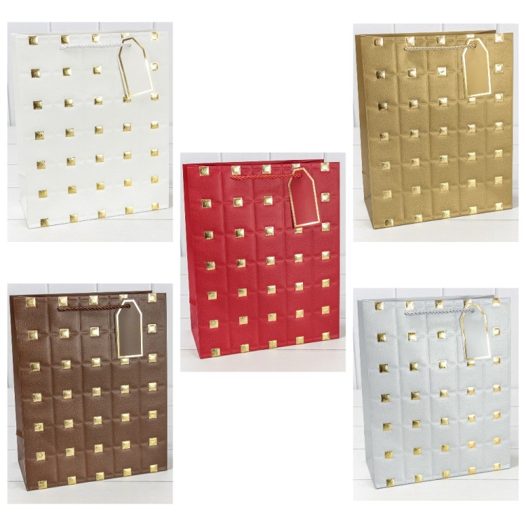 Пакет подарочный с тиснением (микс 554) 26*32*12 210г Белый 1/20 1/240 Арт: 000554C